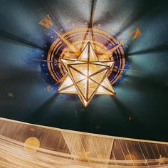 a star hanging from the ceiling in a room