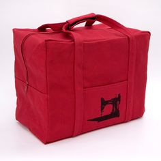 a red bag with a sewing machine on it