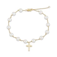 A timeless look that's true to her faith, this cultured pearl cross bracelet is a gift she'll treasure always. 10K yellow gold A dainty polished cross charm centers the style Gorgeous round 5mm freshwater cultured pearls decorate the cable chain 6.5 inches with 1-inch extender; lobster clasp Neil Lane Engagement Rings, Diamond Band Engagement Ring, Mens Gemstone Rings, Fan Jewelry, Wedding Ring Necklaces, Jewelry Charms Pendants, Mens Gold Bracelets, Cross Bracelet, Gold Bracelet Chain