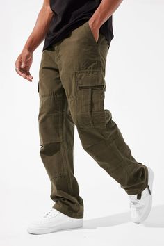 The Brian is our Retro Wide Leg fit Mid-rise waist Functional cargo pockets at both sides 100% Cotton New and improved fit Also available in Black and Khaki Not familiar with our fits? See our Jean Fit Guide *Cozy is 6'1" and weighs 170 lbs. He is wearing our Brian - Airwalk Cargo Pants (32" x 32") in Army Green SA5677MLP Combat Style Cotton Bottoms With Pockets, Long Pants Bottoms With Patch Pockets For Outdoor Activities, Khaki Combat Bottoms With Multiple Pockets, Combat Cargo Pants With Pockets, Full Length Bottoms With Pockets For Outdoor Activities, Combat Style Straight Leg Cargo Jeans With Side Pockets, Combat Style Relaxed Fit Cargo Pants With Pockets, Relaxed Fit Combat Cargo Pants With Pockets, Relaxed Fit Combat Bottoms With Cargo Pockets