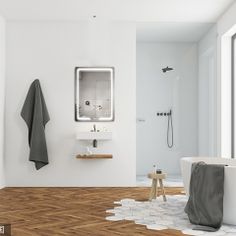 a bathroom with white walls and wood flooring on the floor is pictured in this image