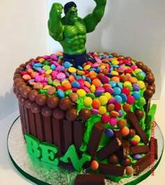 the hulk cake is made to look like it has many candy candies on top