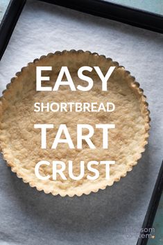 an easy shortbread tart crust in a pan with the words easy shortbread tart crust