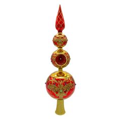 three red and gold ornaments sitting on top of each other in the shape of an egg