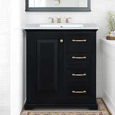 Designed to complement any decor, this freestanding vanity combines elegance with practicality, making it the perfect choice for transforming your spaceAmple storage options and the smooth ceramic basin ensure that your bathroom remains organized and clutter-free. Crafted with a solid wood frame and premium MDF materials, this vanity promises durability and longevity. Shop Now and transform your bathroom into a space that reflects your refined taste and functional needs. Upgrade your bathroom wi 30 Inch Vanity, 30 Inch Bathroom Vanity, Black Vanity Bathroom, Freestanding Vanity, Basin Cabinet, Black Vanity, Ceramic Basin, Vanity Base, Kids Bathroom