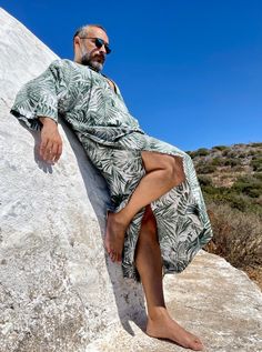 Mens caftan Palm tree leaves cotton viscose Tropical style kaftan small/medium/ large / xlarge /xxlarge / 3XL size options Best for poolside porty costume Kangaroo pocket kaftan for men Feel free to ask for custom design to visit my shop: www.etsy.com/shop/mnouss/ worldwide express shipping Casual Summer Thobe With V-neck, Casual Summer Tunic Thobe, Casual V-neck Summer Thobe, Casual Tunic Thobe For The Beach, Casual Summer Vacation Thobe, Summer Tunic Thobe For Beach Cover-up, Spring Vacation Thobe Tunic, Spring Vacation Tunic Thobe, Summer V-neck Thobe For Beach Cover-up