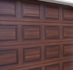 a brown garage door that is open