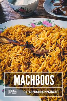 a plate full of food with the words machboos written in front of it