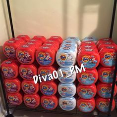 several rows of baby formulas stacked on top of each other in a storage rack