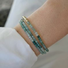 Add a meaningful layer to your look. This 20" colorful ocean-inspired strand features expertly arranged ombré tourmalines with clustered 14k gold rondelles strung on a coated wire for maximum durability. Style it as a necklace or triple-wrap bracelet—it’s up to you. Triple Wrap Bracelet, Ocean Inspired, Ocean Inspiration, Bead Necklace, Wrap Bracelet, Tourmaline, Birthstone, Beaded Necklace, Jewelry Making