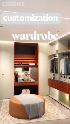 an image of a modern walk in closet with clothes on hangers and a round table