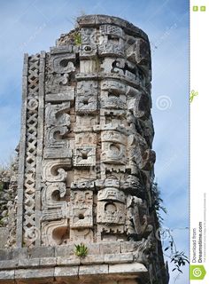 an old stone structure with carvings on it