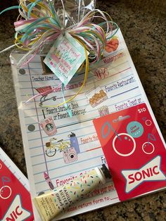 the contents of a sonic toothbrush and its packaging are displayed on a counter top