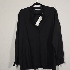 100% Cotton Vince Shirt Brand New Oversized Black Top For Office, Classic Black Shirttail Hem Top, Black Relaxed Fit Shirt For Office, Black Relaxed Fit Office Shirt, Classic Black V-neck Blouse, Black Relaxed Fit Blouse For Work, Black Relaxed Fit Tops For Office, Black V-neck Shirt For Office, Black Relaxed Fit Office Blouse