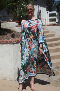 Beautiful tropical print designer silk kaftan for your summer enjoyment.  Casual or dressy you will enjoy this beauty for any occasion. One size.  Fits small to extra large sizes.  The width is 51 inches, edge to edge, 102 around the body.  The side seams are 6 inches from the edge.  The length is 50 inches.  Hand or machine wash on a short, gentle cycle. Silk Kaftan Dress, Silk Caftan, Beach Caftan, Dresses Silk, Long Kaftan, Silk Kaftan, Silk Dress Long, Jungle Print, Kaftan Dress