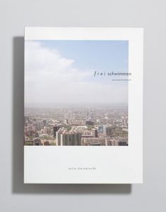 a book with an image of a city in the background and text that reads free as summer