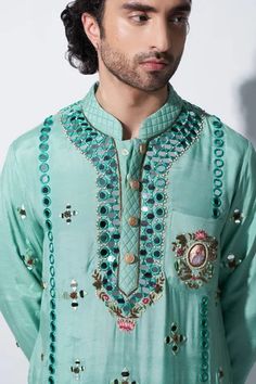 Mint green cotton viscose mirror and thread work embroidered lined kurta with mandarin collar. Comes with salwar. Cotton Viscose, Street Design, Mirror Work, Bamboo Silk, Thread Work, Cuff Sleeves, Mandarin Collar, Green Cotton, Ethnic Fashion