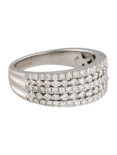 a white gold and diamond ring with three rows of diamonds on the band, set in 18k white gold