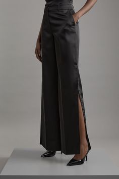 Delivering A Combination Of Dressed-Down Glamour And Statement Style, Discover Collections: 06 Partywear. A New Addition To A Tailored Essentials Collection, These Trousers Are Tailor-Made With An Easy To Style, Sleek Design, Split Detailing, And A Comfortable Wide Fit. The Satin Fabric Makes For A Unique Take On A Formal Outer Layer. Style This Piece With A Shirt And Heels For A Look That Goes Seamlessly From Occasion Nights To Date Nights. Structured Viscose Satin Tailored Wide Leg Trousers Hi Elegant Tailored Dress Pants For Party, Glamorous Fitted Pants For Gala, Elegant Fitted Wide Leg Pants With Side Slits, Fitted Wide Leg Trousers With Side Slits, Elegant Full-length Dress Pants For Night Out, Elegant Dress Pants For Night Out, Sleek Satin Pants For Evening, Glamorous Satin Pants For Formal Occasions, Glamorous Satin Formal Pants