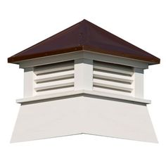 a white chimney with a brown roof