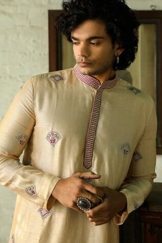 Beige straight kurta with floral embroidered buttis. Paired with a pant. - Aza Fashions Raw Silk Embroidery, Men Kurta, Designer Suits For Men, Straight Kurta, Embroidery Floral, Sustainable Fashion Brands, Kurta With Pants, Silk Embroidery, Pants Pattern