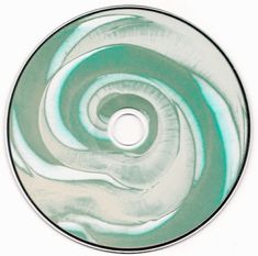 an image of a cd disc with swirls on the front and back cover in green