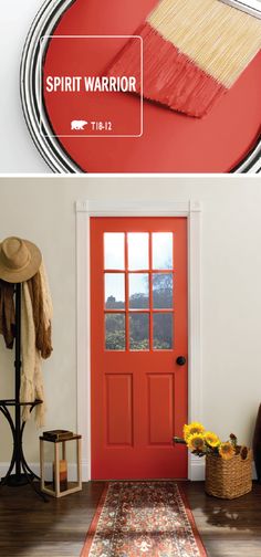 a red door with the words spirit warrior painted on it and an image of a broom