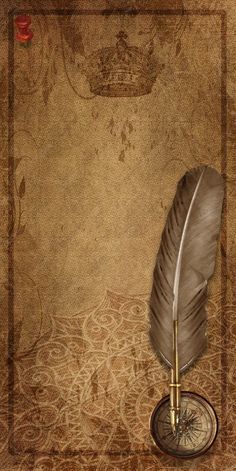 a feather quill and compass on a brown background