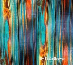 an abstract painting with blue, orange and yellow stripes on wood grained paper by paul bewer