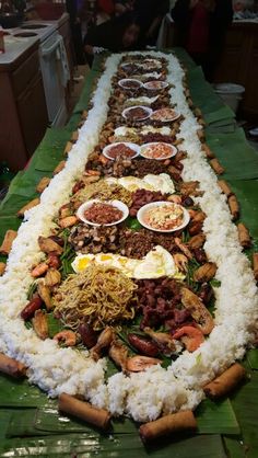 a long table filled with lots of food