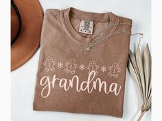 Grandma Christmas Shirt, Cute Grandma Holiday Shirt, Xmas Day Shirt for Grandma, Cute Gingerbread Shirt for Grandma, Grandma Tshirt - Direct to garment printed on Comfort Colors 1717 Crewneck T-shirts - Shirt sizes are unisex, please refer to sizing chart in listing photos - 100% combed and ring-spun cotton (fiber content may vary for different colors) CARE Machine wash cold (not exceeding 90 F) inside out Hang dry highly recommended, tumble dry low inside out if desired Do not iron on the print Christmas Cricut Shirts, Gingerbread Shirt, Grandma Tshirt, Cute Grandma, Grandma Christmas, Grandmas Christmas, Grandma Shirts, Holiday Shirt, Color Care