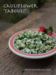 cauliflower tabouli in a bowl on a wooden table