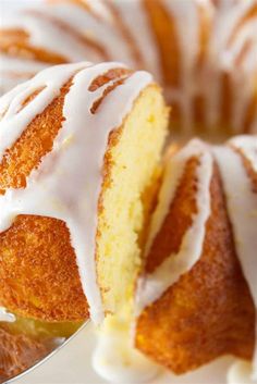 a bundt cake with white icing on a plate