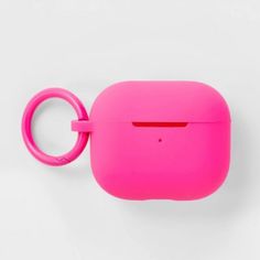 a pink case with a ring on the front and side for an apple airpods