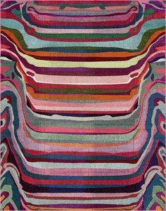 a multicolored rug with wavy lines on it