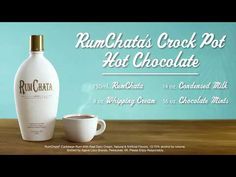 a bottle of rumchata's crock pot hot chocolate next to a cup of coffee