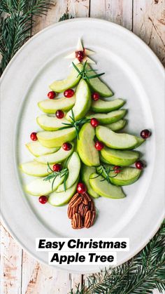 an apple christmas tree on a white plate