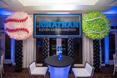 a baseball themed party with balloons and decorations