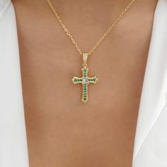 Material: gold plated stainless steel, crystals Length: 17" + 1.5" extension Pendant size: 0.75" x 1" IMPORTED Emerald Cross, Necklace Emerald, Gold Cross, Gemstone Necklace, Cross Necklace, Emerald, Gold Plate, Plating, Stainless Steel