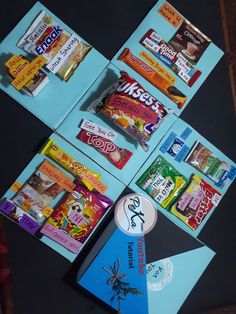 several different types of candy are arranged on top of each other, including an envelope