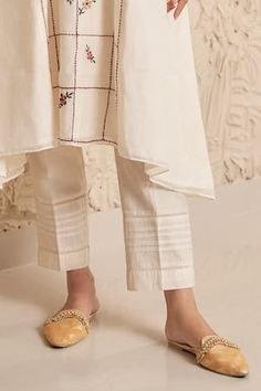 Ivory chanderi asymmetric kurta with checks, floral and thread embroidered yoke. Paired with coordinating straight pleated pant. - Aza Fashions Asymmetric Kurta, Pleated Pant, Pant Women, Women Kurta, Straight Kurta, Kurta With Pants, Pants Pattern, Aza Fashion, Floral Embroidery