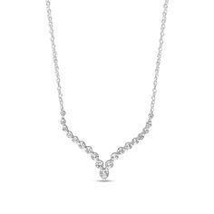 Elevate your attire when you wear this white lab-created sapphire graduated "V" necklace, a beautiful choice for day or night. Fashioned in sterling silver Shimmering white lab-created sapphires graduate in size to the largest 3.5mm center stone along this curved "V"-shaped ribbon. This design suspends centered along a rope chain. The 18.0-inch necklace secures with a spring-ring clasp. V Necklace, White Lab, Rope Chain, Spring Rings, V Shape, Diamond Necklace, Silver Necklace, Sapphire, Lab