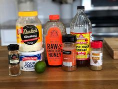 the ingredients to make this dish are displayed on a wooden table