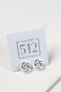 This fashion-forward Silver Metal Knot Stud Earring is perfect for making an instant statement. Crafted of high-quality silver, the simple knot design offers an on-trend take on classic stud earrings. Wear them to make a subtle, stylish addition to any outfit. #jewelrytrends #fashionjewelry #statementjewelry #jewelryinspo #jewelrydesign #jewelryoftheday #jewelrygoals #jewelrystyle #jewelryideas #jewelryfashion #jewelryinspiration #jewelrygram #jewelryphotography #gallery512boutique Knot Stud Earrings, Knot Studs, Knot Design, Stud Earring, Jewelry Inspiration