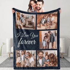 a man and woman holding up a blanket that says i love you forever