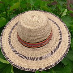 *Straw hats are popular for every good reason and use. Serving as a hat gift, summer beach hats, fashion hats, festive hats, sun hats and a hat for gardening. They come in several editions; kids' hats, women's hats, men's hats and unisex hats. The widebrim style of it protects against direct sun rays making it ideal hay for summer beach expeditions. It's also suitable for use as a retro party hat, or festive hat.  *kindly note as much as we try to produce exactly the hat you chose, no two handmade would be exactly the same. The beauty definitely exists in the  supposed small imperfections. *Please contact us for bulk purchases and customized orders. Handwoven Straw Panama Hat With Curved Brim, Handwoven Curved Brim Panama Hat, Handwoven Straw Brimmed Fedora, Handwoven Brimmed Straw Fedora, Natural Wide Brim Woven Boater Hat, Natural Woven Wide Brim Boater Hat, Natural Handwoven Boater Hat With Curved Brim, Handwoven Straw Fedora Sun Hat, Handwoven Brimmed Fedora For Vacation