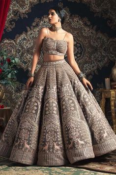 Mink grey lehenga with all-over embroidery. Paired with blouse, trail and scallop dupatta. Grey Lehenga Outfit, Grey Lehenga Jewellery Ideas, Grey Bridal Lehenga, Rachit Khanna, Sangeet Lehengas, Geometric Lehenga, Grey Lehenga, Embroidered Bridal Lehenga, Grey Embroidery