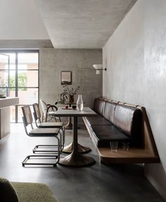 a long table and benches in a room