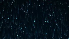 rain falling down on the ground at night with blue lights in the dark, looped