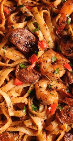 Shrimp and Sausage with Fettuccine Pasta, made with Cajun Creamy Sauce in a skillet Shrimp Sausage Pasta, Cajun Shrimp Pasta With Sausage, Sausage And Shrimp Recipes, Shrimp And Sausage Pasta, Creamy Cajun Shrimp, Pasta Fettuccine, Pasta Garlic, Creamy Cajun Shrimp Pasta, Weeknight Pasta